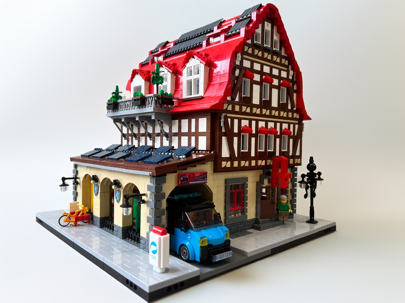 Traditional Style Lego Healthcare Building with Blue Car